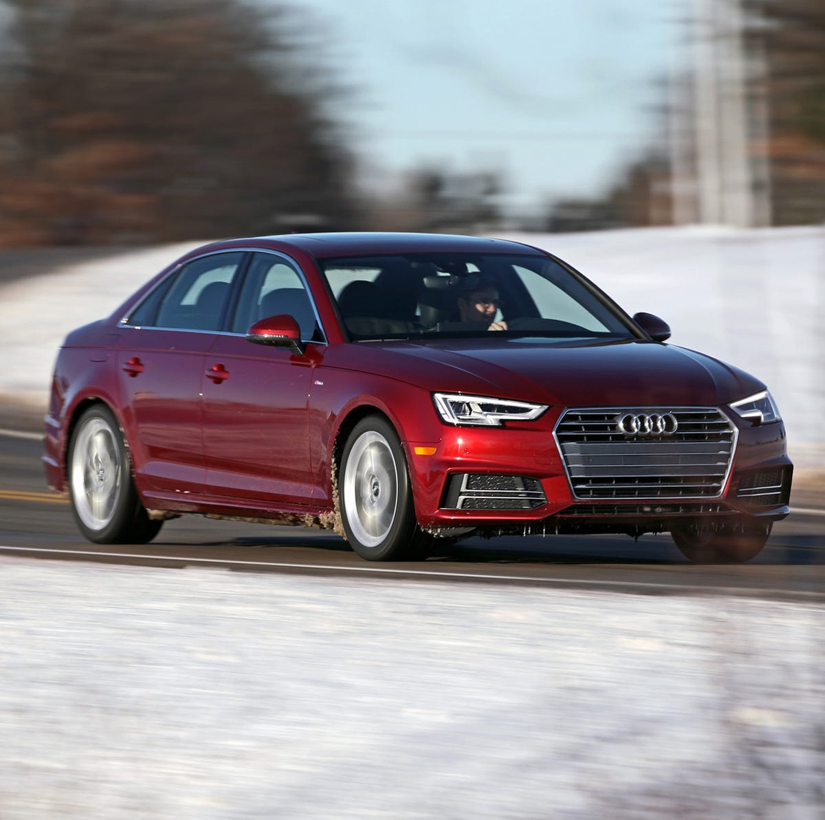 Audi A4 Years to Avoid: Complete Buyer's Guide 2025 5 2018 Audi A4 B9 generation 2.0T Quattro in red driving on a winter road