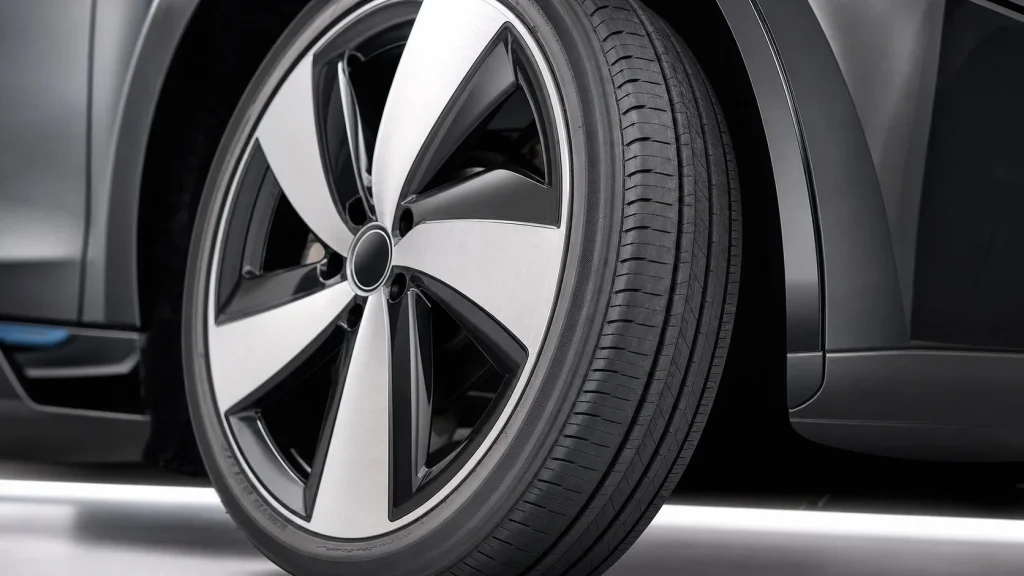 2020 BMW i3 Review: Used Price, Range, and Specs 8 A close-up view of the unique tall and narrow Bridgestone Ecopia EP500 tire tread on a 2020 BMW i3 wheel.