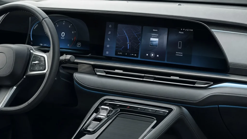 The premium curved display panel and center console of the 2023 BMW 2-Series interior