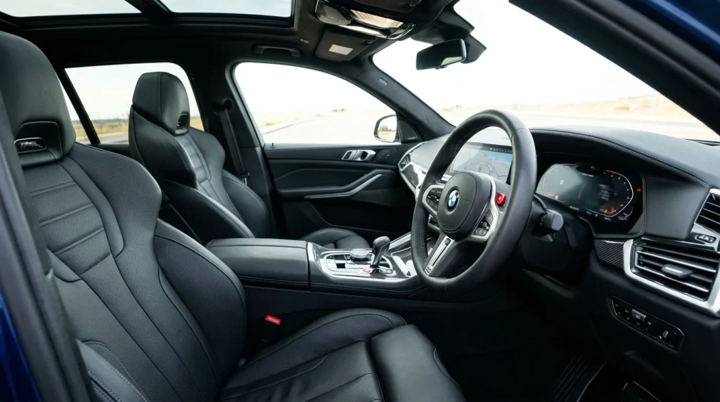 Clean interior cabin and leather sport seats of a modern BMW M performance crossover