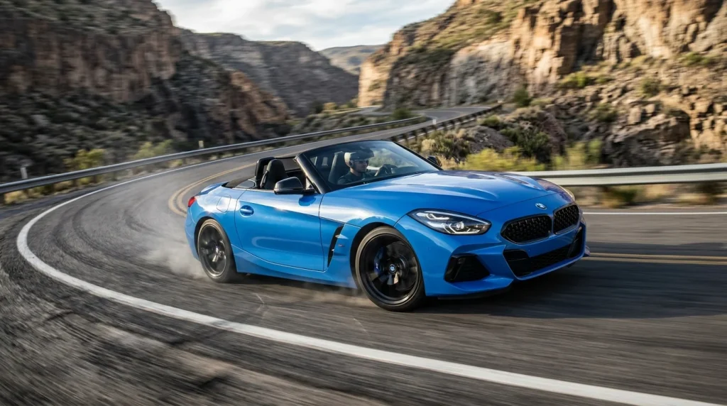 A 2023 BMW Z4 M40i roadster driving fast through a canyon curve.
