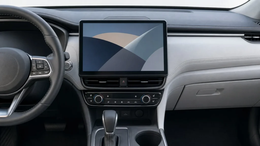 The premium dashboard interior of a luxury sport sedan showing the touchscreen and physical controls.