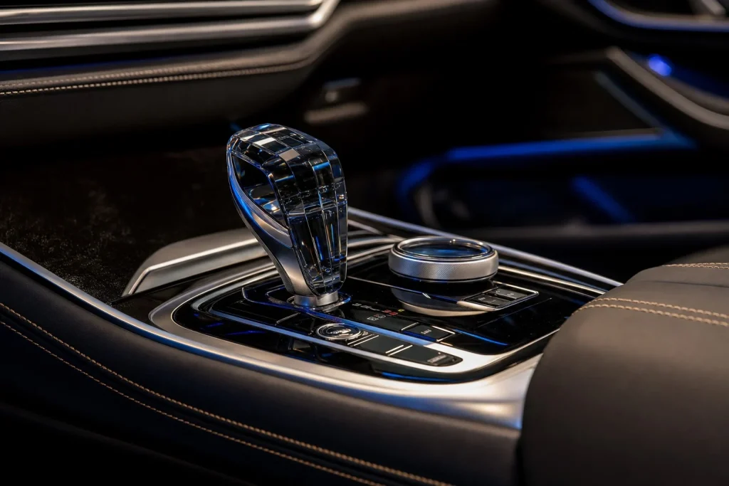 2025 BMW 8 Series Gran Coupe Review: Price, Specs & Math 4 The luxury crystal-glass gear selector and leather center console of the 2025 BMW 8 Series Gran Coupe.