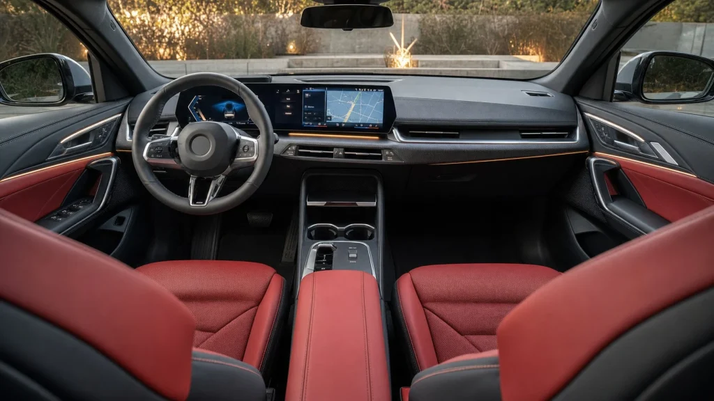 The modern interior of the 2025 BMW X2 showing the curved dual-screen dashboard and sport seats