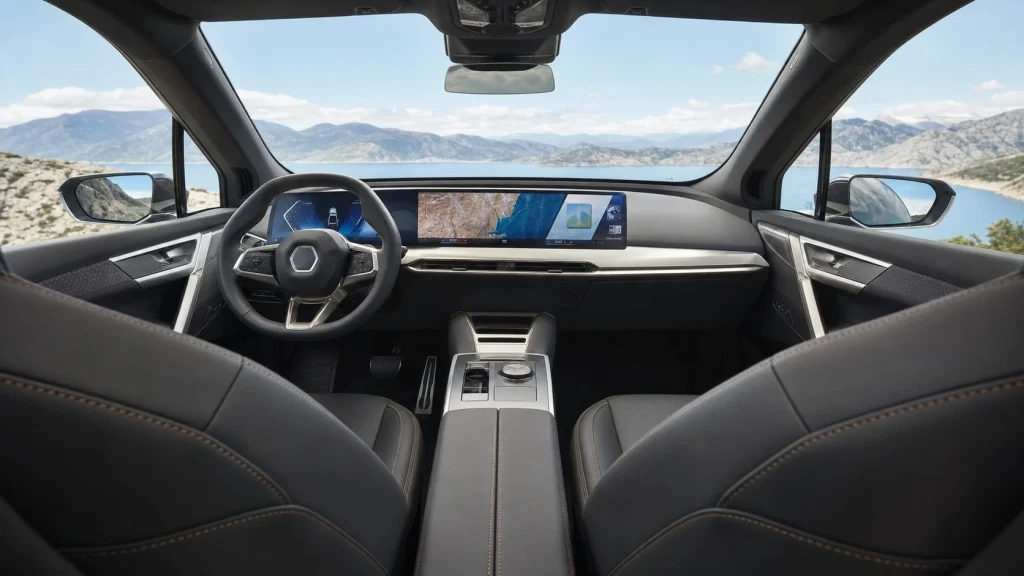 2026 BMW iX Review: Price, Range, and Performance Specs 2 Modern dashboard and M Sport seats inside the 2026 BMW iX cabin