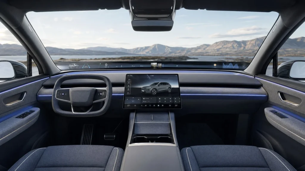 Minimalist interior cabin of the 2026 BMW iX3 showcasing the 43.3-inch Panoramic Vision display at the base of the windshield