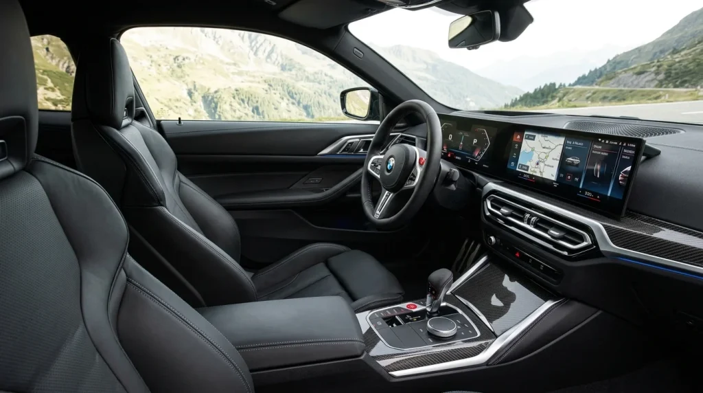 The modern interior cabin and Curved Display of the 2026 BMW M4.