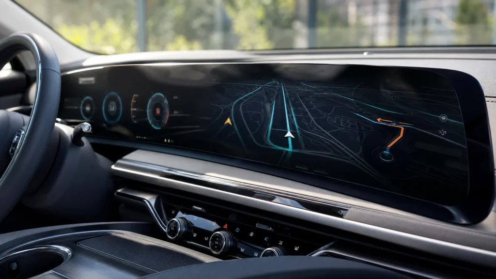 Compare Audi Q5 vs Genesis GV70 (2026): Luxury SUV Comparison 2 The 27-inch curved OLED dashboard display inside the 2026 Genesis GV70 luxury SUV